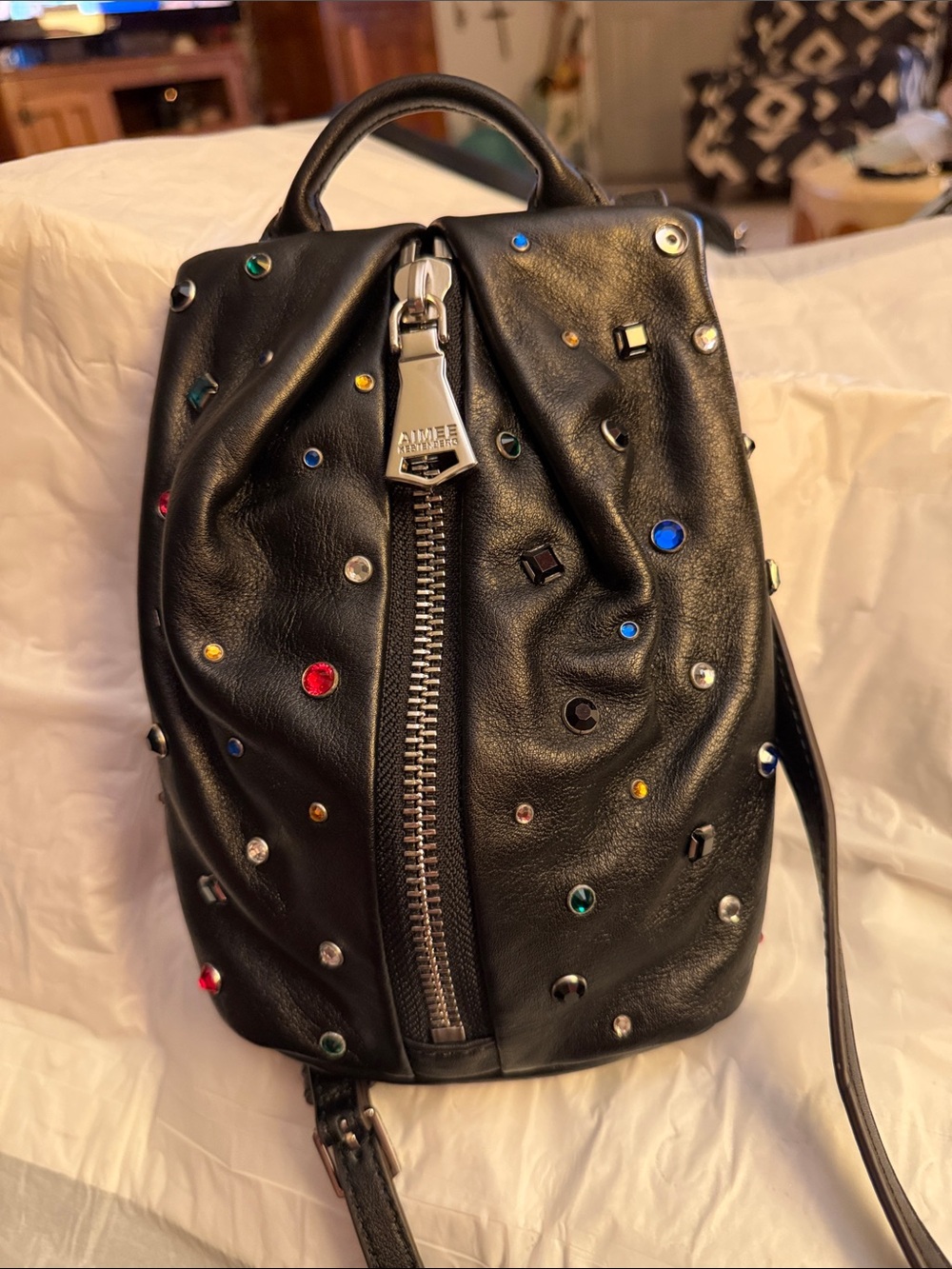 Aimee Kestenberg Black Leather Crossbody Backpack with Multicolor Studs